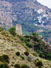 Fototapeta na wymiar Tower on rocky coast, seaside cliffs, Spain