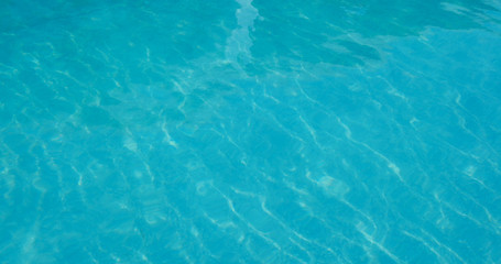 Fototapeta na wymiar Swimming pool water wave texture
