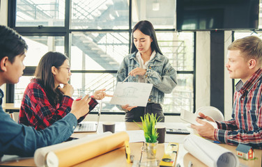 The business team is reviewing the house construction plan