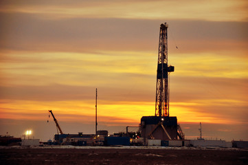 The drilling rig during sunset