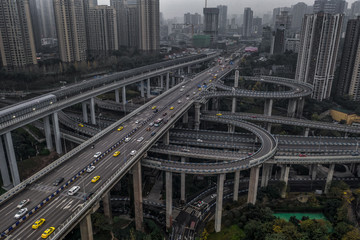 Fototapeta na wymiar Aerial drone shot of flyover highway to E'GongYan Bridge in Chongqing, China