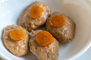 Isolated close up of delicious and fresh Gefilte fish (stuffed fish) dish on the Seder table on Passover Jewish Holiday- Israel