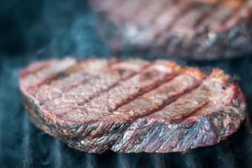  Isolated close up of a delicious beef Picanha steakf roasting on a hot grill- Israel