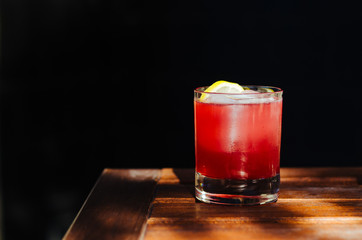 Red cocktail with ice