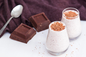 Chocolate chia pudding in glass. Healthy organic snack with omega 3.