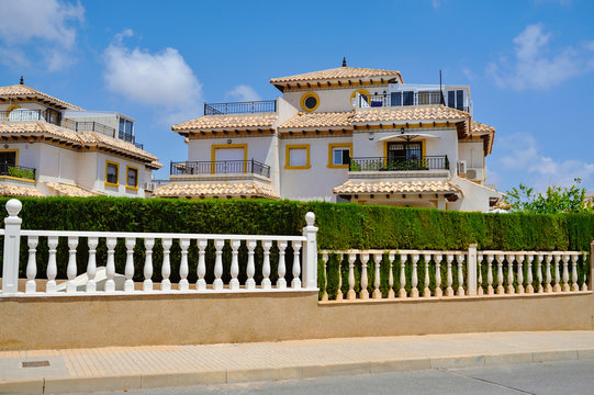 Canarian style houses in the resort town of Orihuela, La Zenia, Spain.