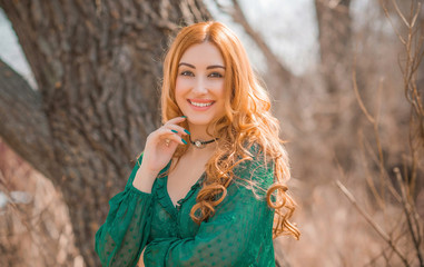 Naklejka premium Boho modern style, redhead girl in lace vintage green blouse and skirt 