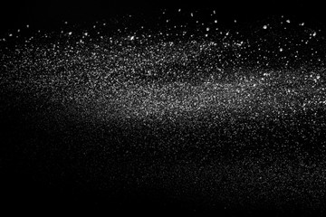 Launched colorful powder, isolated on black background