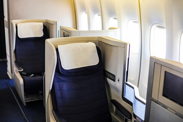 Interior view of Empty Airplane seats on board a jet liner