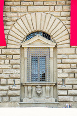 decorated and ancient window of historic building of the Italian Renaissance