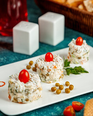 capital salad with tomatoes and green peas