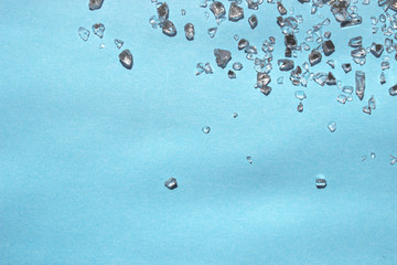 Minerals, sea salt on blue background. Free copy space. Concept of relax. 