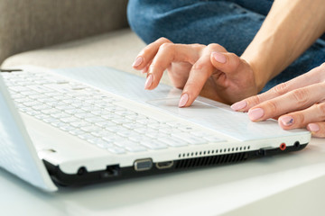 Hand of young woman, which working from home