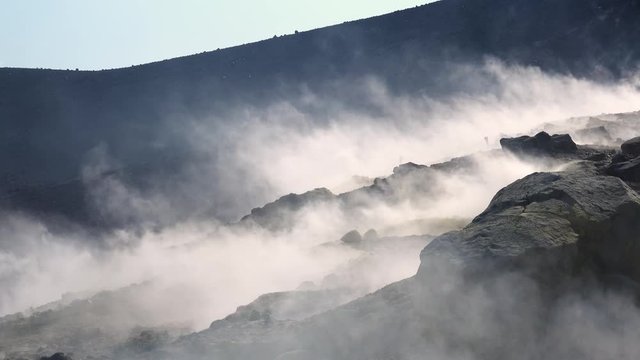 Hot volcanic gas exiting through fumaroles on Vulcano island. Steaming surface. Lipari Islands. Sicily, Italy. Close up