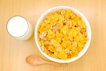cereal in a white bowl on wooden background. Healthy breakfast concept.