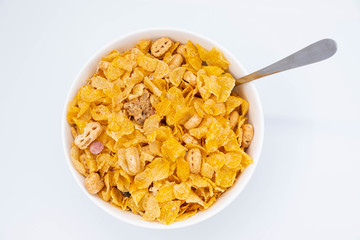 cereal in a white bowl on white background. Healthy breakfast concept.