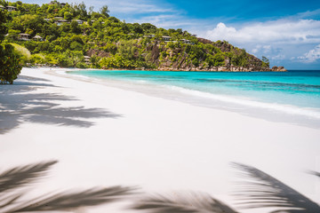 An empty exotic sandy beach Petite Anse on Mahe Island,Seychelles islands. Vacation at summer season