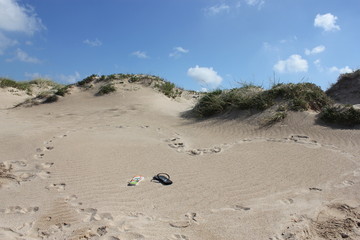 heart drawn in the fine beach sand