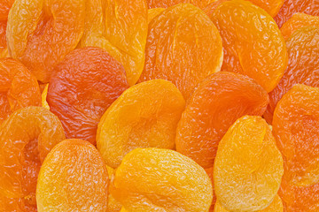 Top view of dried apricots close up. Food background.