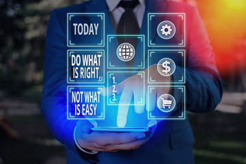 Writing note showing Do What Is Right Not What Is Easy. Business concept for willing to stand up...
