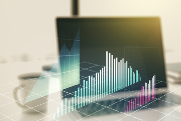 Double exposure of abstract creative financial chart on modern laptop background, research and strategy concept