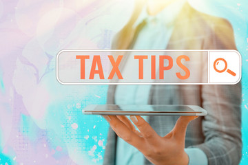 Conceptual hand writing showing Tax Tips. Concept meaning compulsory contribution to state revenue...