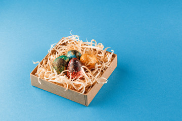 Four multi-colored easter eggs.