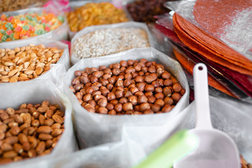 spontaneous market, cashews and walnuts on a shelf for sale