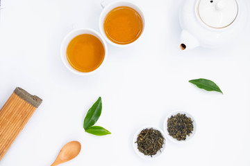 teapot and tea on white  background, over light