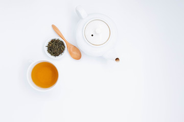 teapot and tea on white  background, over light