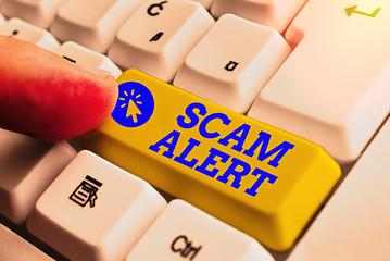 Handwriting text Scam Alert. Conceptual photo unsolicited email that claims the prospect of a...