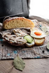 Homemade bread with mushroom bruschettas and omlette 