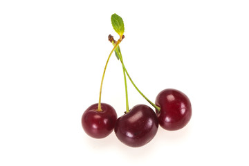 Sweet ripe cherry with leaves