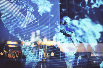 Fototapeta premium Double exposure of business theme icons and work space with computer background. Concept of success.