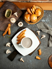 mushroom cream soup and a basket of bread