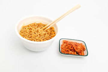 Instant cup ramen on white background
