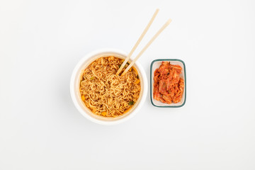 Instant cup ramen on white background
