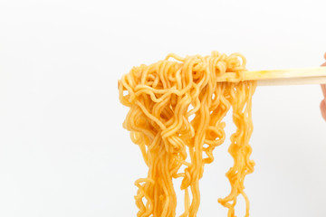 Instant cup ramen on white background