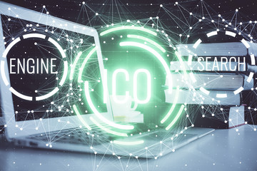 Multi exposure of blockchain and crypto economy theme hologram and table with computer background....