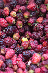 Background of sweet fresh raspberries closeup