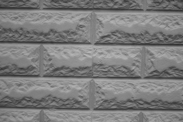 Close view of light grey brickwork texture