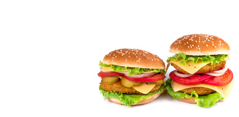 Two delicious hamburgers isolated on white background