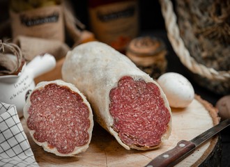 salami sausage and egg on table