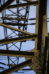 bolting of a power pole with many cross braces