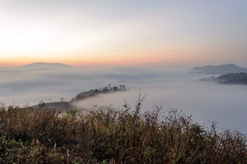 Fototapeta na wymiar Sunrise mist mountain Yun Lai Sea Viewpoint is located at Santichon Village, Wiang Tai Subdistrict, Pai District, Mae Hong Son Province in Thailand
