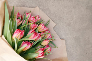 Bouquet of tulips on a gray background