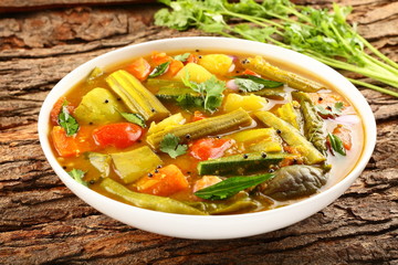 Bowl of tasty vegetable curry- sambar dish- South Indian cuisine