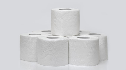 Rolls of toilet paper on a white background. Outbreak of the coronavirus concept COVID-19. Coronavirus - 2019-nKoV. Stay at home while in quarantine.