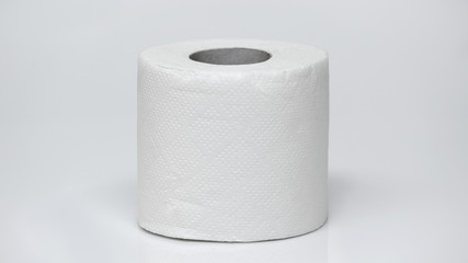 Rolls of toilet paper on a white background. Outbreak of the coronavirus concept COVID-19. Coronavirus - 2019-nKoV. Stay at home while in quarantine.