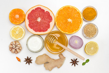 Set of healthy food to boost immune system. Citrus, ginger, honey, garlic, onions. Medical nutrition at home,